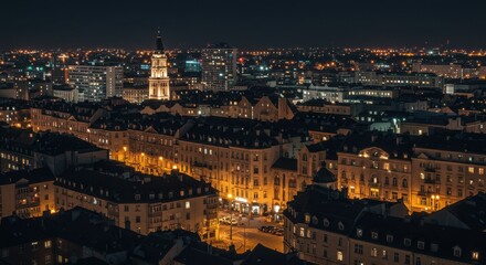 Obraz premium Night Cityscape: Golden Lights and Urban Architecture