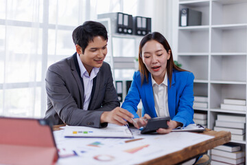 Team of Accounting business are calculating income-expenditure and analyzing real estate investment data on tablet computer, Financial and tax systems concept.
