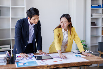  Asian business team creative businesspeople coworker in office Happy to be successful partnership teamwork celebrating achievement and success concept.
