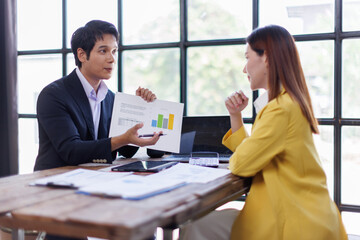 Team of Business people advisor, business people talking, planning analyze investment and marketing on tablet in office.
