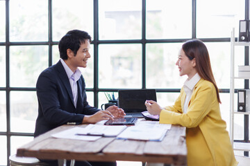 Fototapeta premium Team of Business people advisor, business people talking, planning analyze investment and marketing on tablet in office. 