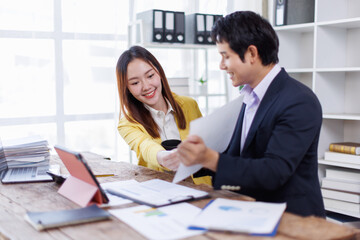 Financial Business team analyze the graph of the company's performance to create profits and growth, Market research reports and income statistics, Financial and Accounting concept.