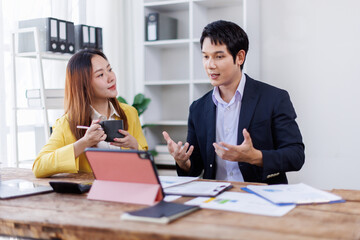 Financial Business team analyze the graph of the company's performance to create profits and growth, Market research reports and income statistics, Financial and Accounting concept.