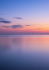 Pink Purple Sunset Over Calm Ocean Water