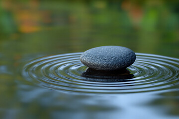 stone skimming lake ripples skipping