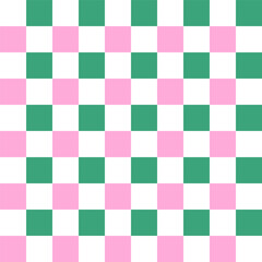 Checkered plaid repeat pattern in green pink white.Geometric gingham seamless pattern for Christmas.Colorful abstract background with squares.Vector graphic wallpaper.