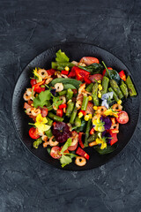 Shrimp Salad Bowl with Fresh Greens and Vegetables.