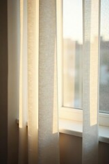 Soft morning light streaming through sheer white curtains on a defocused window background, bright, peaceful, soft