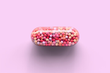 Transparent NAD+ capsule with vibrant colorful contents on pink surface. Concept of anti-aging therapy and life extension. 3d illustration, rendering.