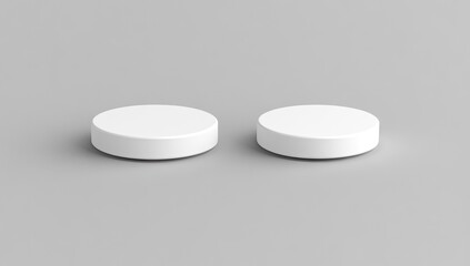 Two simple white round objects