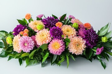 Fototapeta premium Vibrant floral arrangement with a mix of peach, pink, and purple blooms.