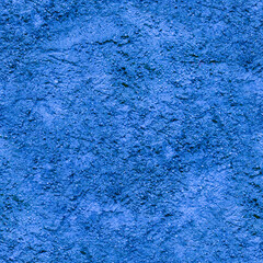An old, blue cement wall. Blue, stone background. Ancient ruins. Concrete texture. Seamless image.