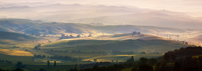 Valley at sunrise near Montalcino, Tuscany, Italy