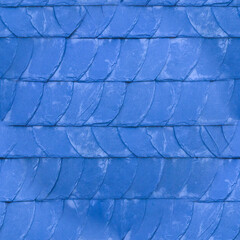 The old blue tile wall. Blue stone background. The texture of the tile. Brickwork. Seamless image.