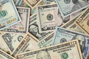 Stack of dollar bills. Hundred, fifty, twenty, ten, five dollars banknote close up