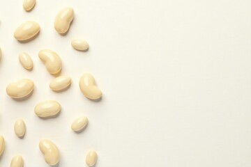 Scattered white beans against stark white backdrop, white, background, nature