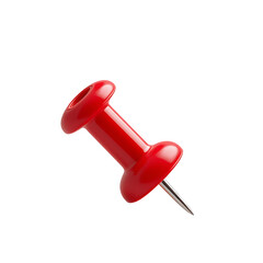 A red plastic pushpin, a sharp office tack, is isolated on a white board
