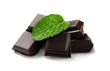 Dark chocolate pieces and mint leaf on white background