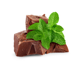 Milk chocolate chunks and mint leaves on white background