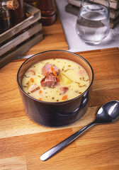 Potato soup with smoked pork meat