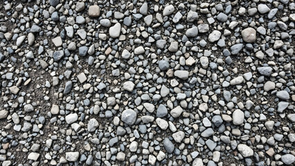 Obraz premium Aged gravel texture with detailed surface elements, background asset for posters or flyers. Professional quality visual asset