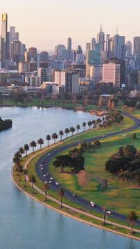 Aerial View of Melbourne Skyline and Albert Park Lake at Sunset