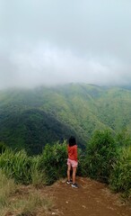 Naklejka premium man walking in the mountains