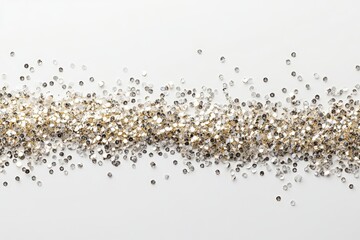 Sparkling silver glitter scattered across a white surface creating a shimmering effect and enhancing visual appeal for festive decorations and artistic projects glitter concept