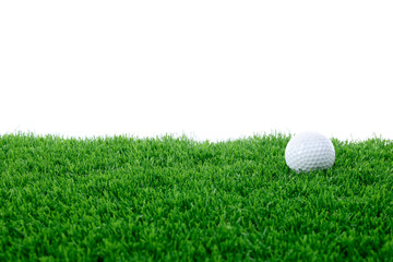 Golf ball on green grass against white background