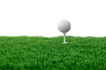 Golf ball, tee and green grass against white background