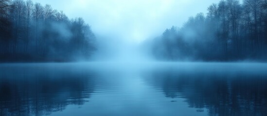 Fototapeta premium Misty Lake Serenity: A Tranquil Blue Escape