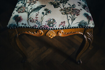 Decorative chair on the parquet