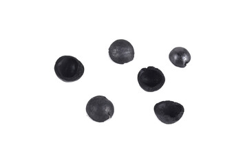 charcoal macadamia isolated on white background