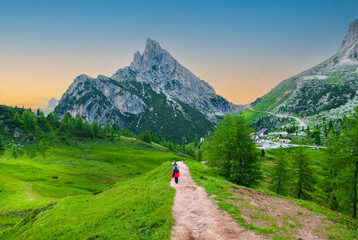 trekking  in the beautiful mountains on the Falzarego Pass in the Italian Dolomites