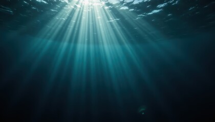 Moody underwater scene with air bubbles and sun rays, space for text, mysterious or deep concept