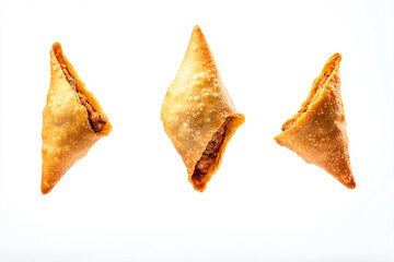 three small pastries are shown on a white surface