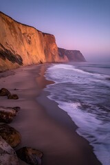 Obraz premium Serene Sunset Beach Coastal Cliffs Landscape