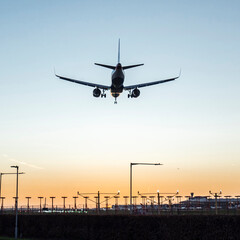 Airplane Landing at Dusk – Rear View 3