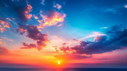 Fototapeta premium Vibrant Sunset Over Ocean With Colorful Clouds