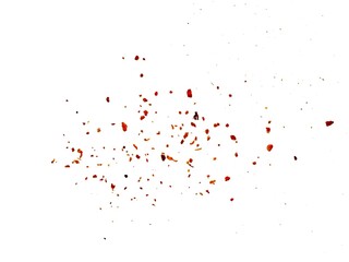 Dried red chili powder flying. Grainy scatterings of spicy burst . Splashes of red pepper powder.Overlay effect chilli or paprika spice splatters.