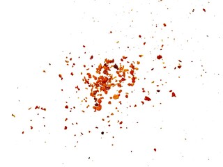Dried red chili powder flying. Grainy scatterings of spicy burst . Splashes of red pepper...