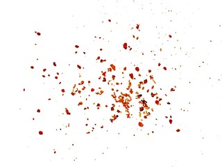 Dried red chili powder flying. Grainy scatterings of spicy burst . Splashes of red pepper powder.Overlay effect chilli or paprika spice splatters.