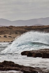 Waves Crashing on the Rocky Shore of Fuerteventura