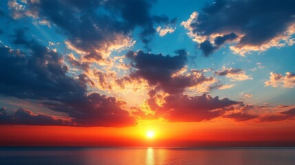 Obraz premium Vibrant Sunset Over Ocean With Colorful Clouds