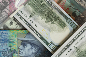 Australian dollar and US dollar banknotes. Cash. Financial concept.