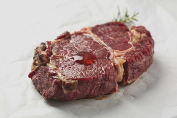 a fresh piece of meat, a large beef steak