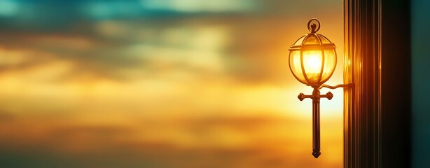 Fototapeta premium A stunning sunset with a lantern silhouetted against the vibrant sky.