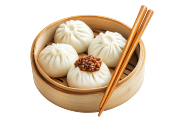 Steamed dumplings in bamboo steamer with wooden chopsticks placed on top, isolated on a white transparent background, concept of Asian cuisine