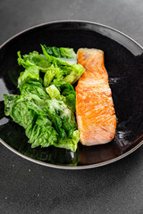 Salmon fried fish seafood dish fresh delicious gourmet food background on the table rustic food top view copy space keto paleo diet vegetarian food pescetarian diet