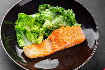 Salmon fried fish seafood dish fresh delicious gourmet food background on the table rustic food top view copy space keto paleo diet vegetarian food pescetarian diet